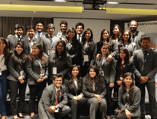 Group of MBA graduates and working professionals at a business event